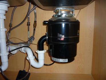 Insinkerator garbage disposal installed by our Stockton plumbing team